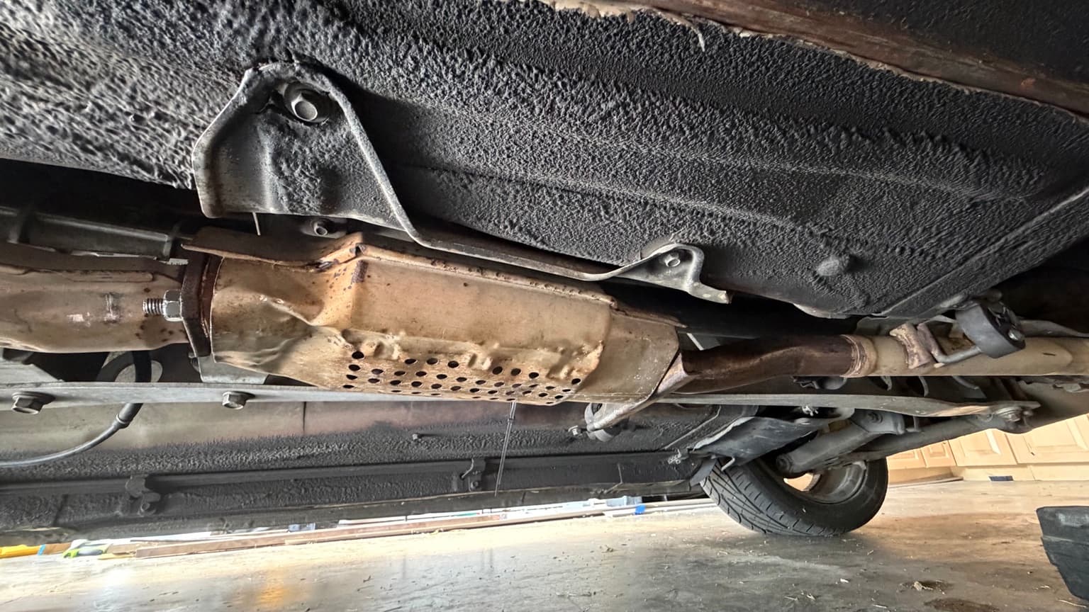 Catalytic converter installed underneath the Mazda Miata