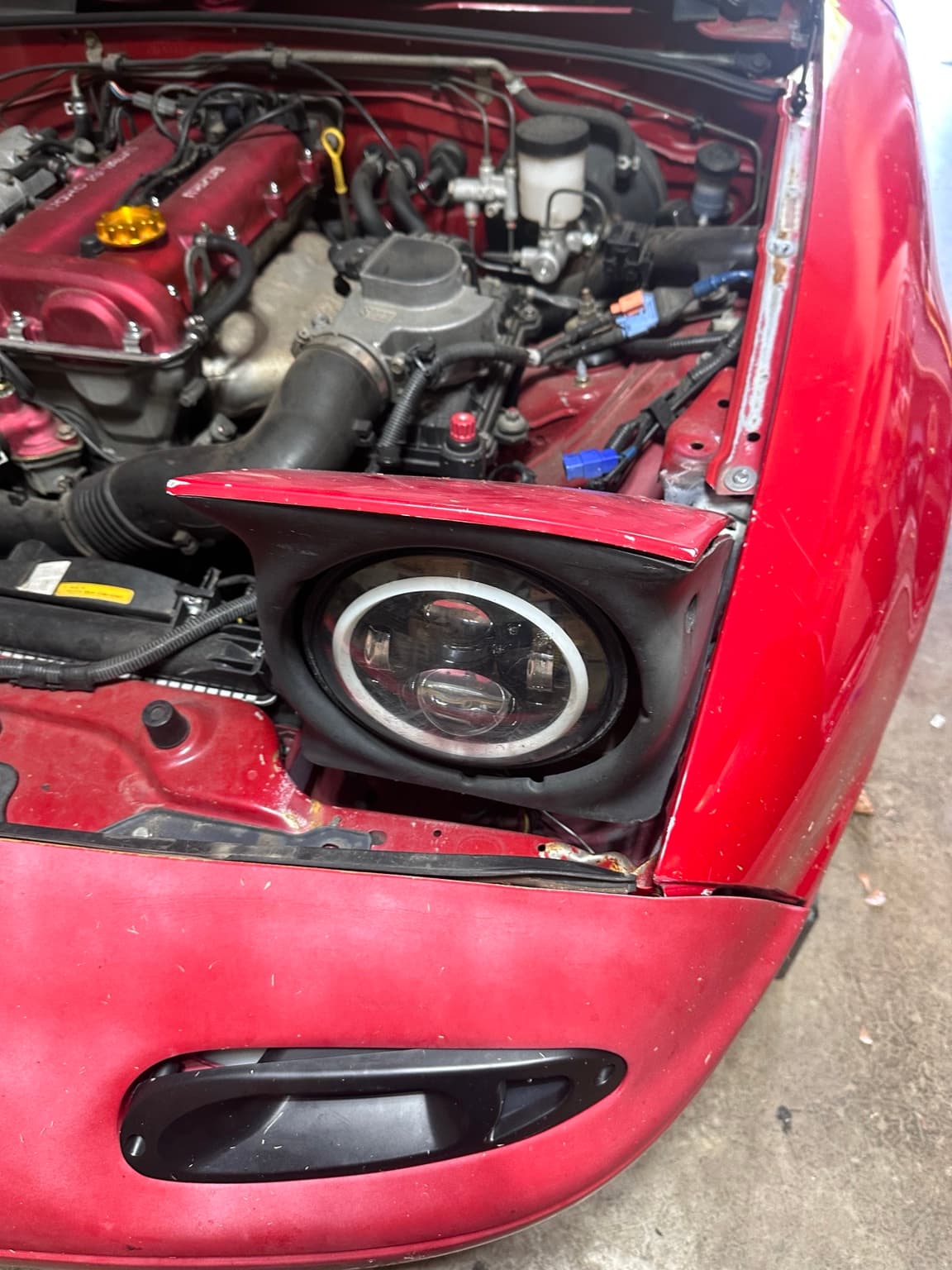 Miata headlight after wiring repair and installation