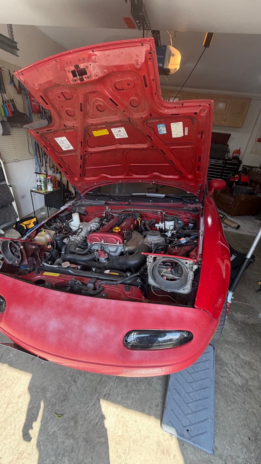Mazda Miata engine bay during maintenance