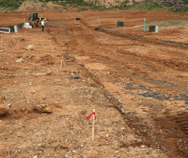 Construction stakes placed for curb layout